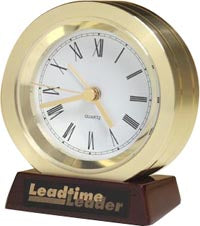 Solid turned gold aluminum clock on rosewood piano-finish base [TDC917]